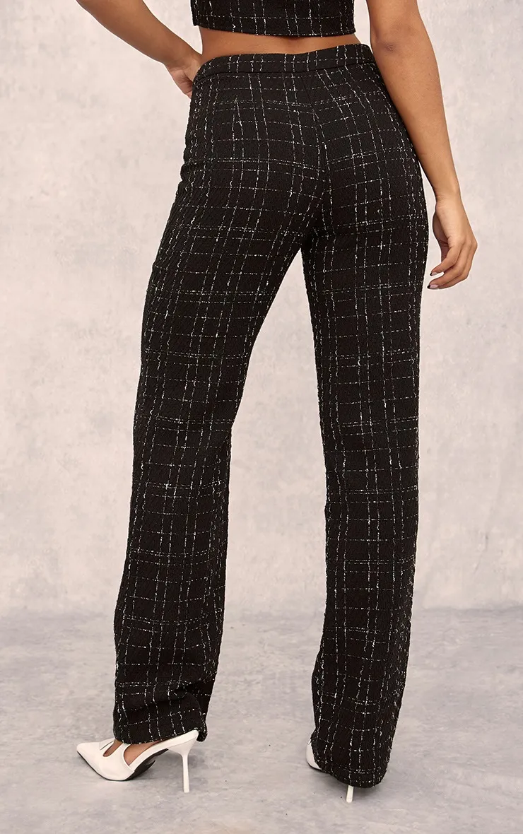 Pantalon de tailleur noir en maille bouclée à taille haute