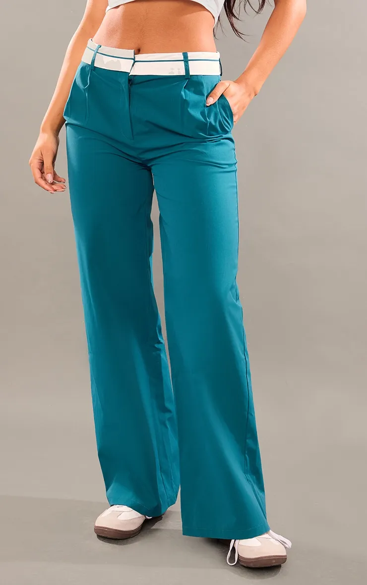 Pantalon droit vert à revers sur la taille