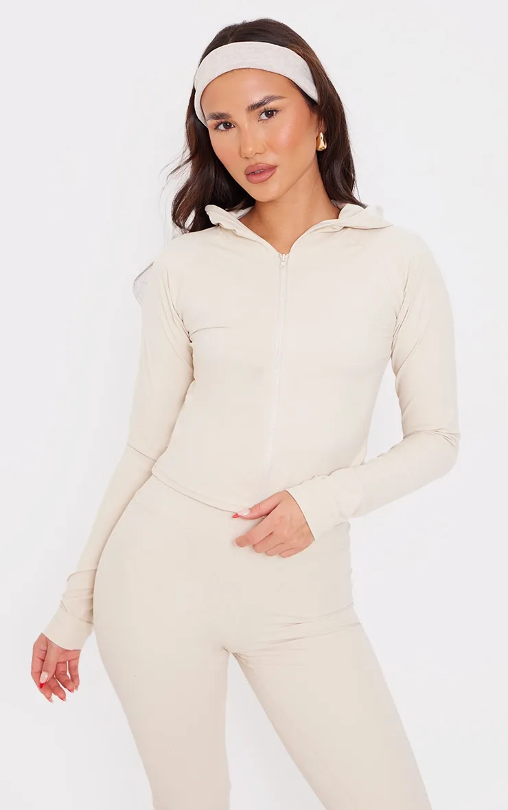 Veste de sport sable Sculpt Luxe à capuche et manches longues